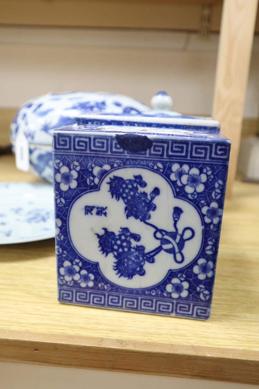 Chinese blue and white porcelain - a dragon box and cover, two jars and one cover, two pillows and a plate